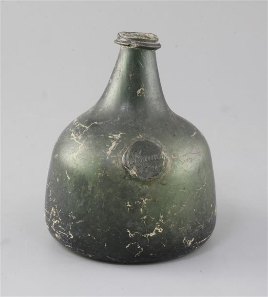 An olive green transitional onion / mallet shaped wine bottle, height 15cm, small chips